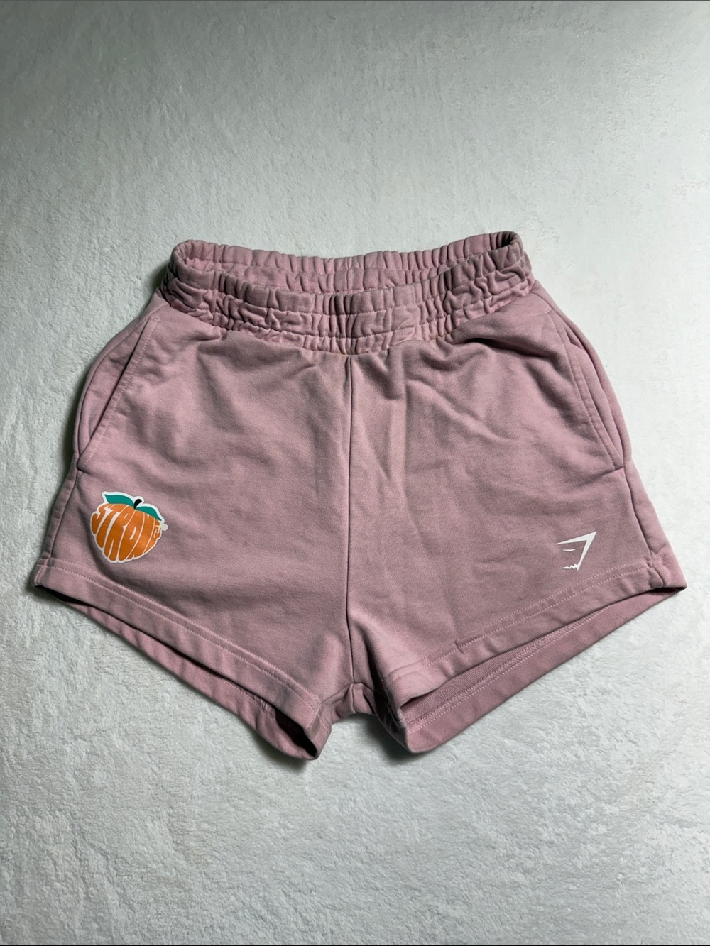 Gymshark Women's Mauve Pink Athletic Lounge Shorts with Peach Graphic